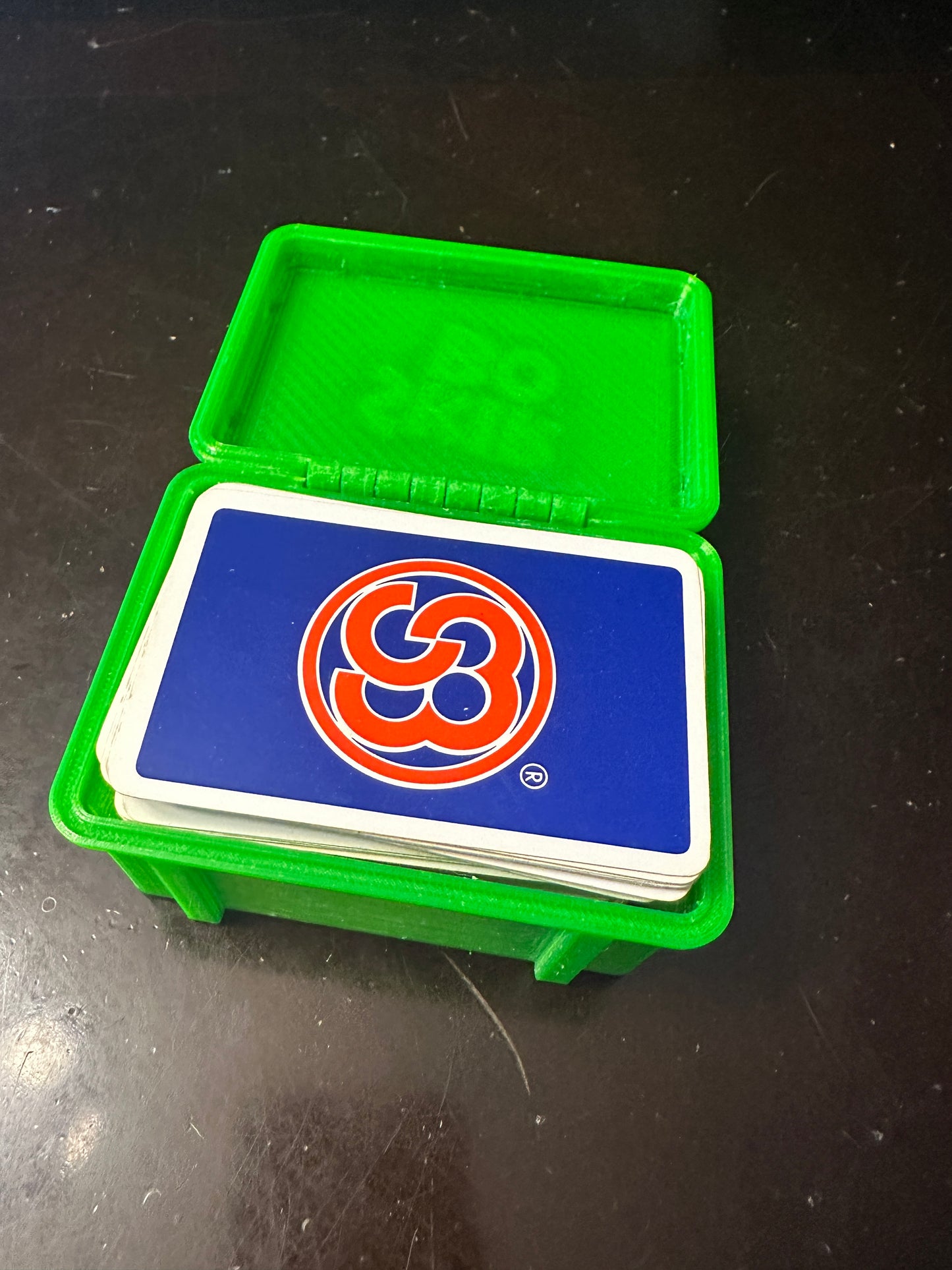 Boîtier pour jeu Skip-Bo